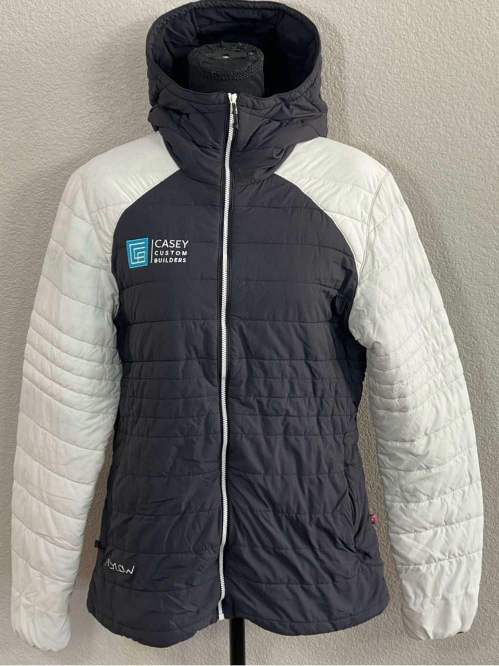 Flylow Women’s  Black & White Quilted Hooded Jacket. Size Large